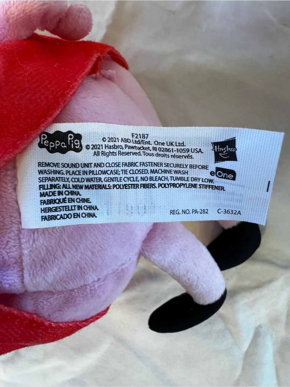 Hasbro Pink Pig Plush with Red Dress and Yellow Note Accent